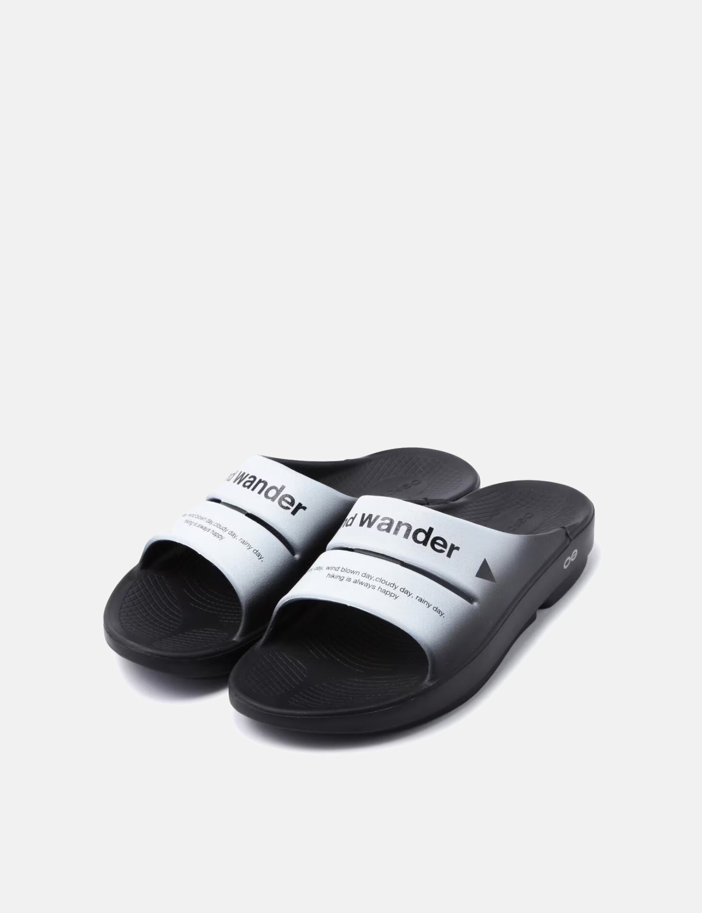 and Wander x Oofos Ooahh Recovery Slider - Black | Article. and Wander x Oofos Ooahh Recovery Slider - Black | Article.